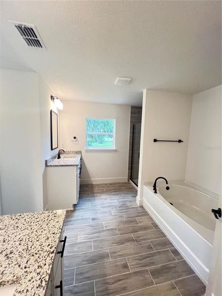 Furnished interior view inside a new home in Hill Country Estates, Dade City (Image 4).