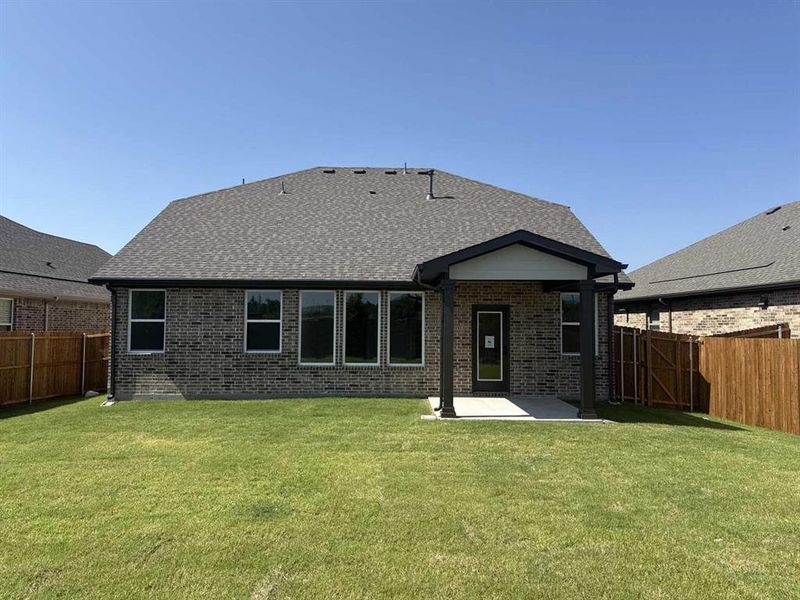 Front exterior of a new home in Meadow Park, Melissa, TX, highlighting curb appeal (Image 26). Front exterior of a new home in Meadow Park, Melissa, TX, highlighting curb appeal (Image 26).