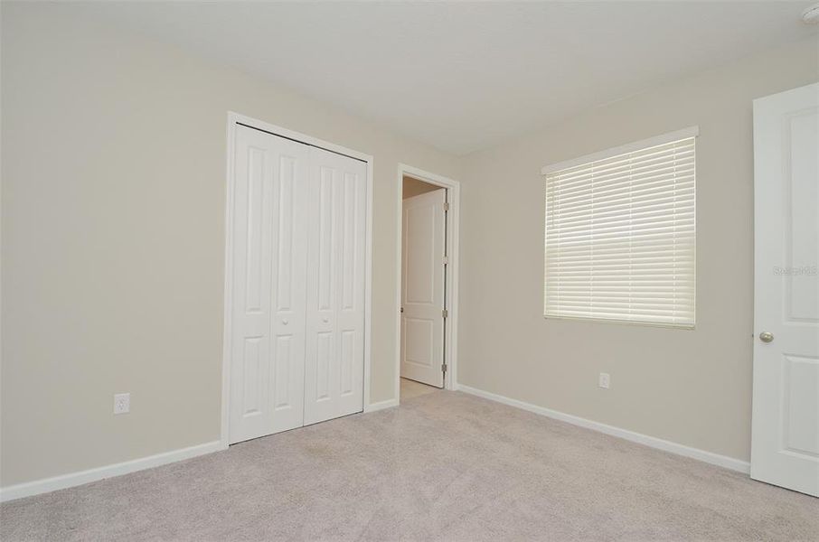 Spacious, unfurnished interior of a new home in Seasons at Eden Hills, Lake Alfred (Image 34).