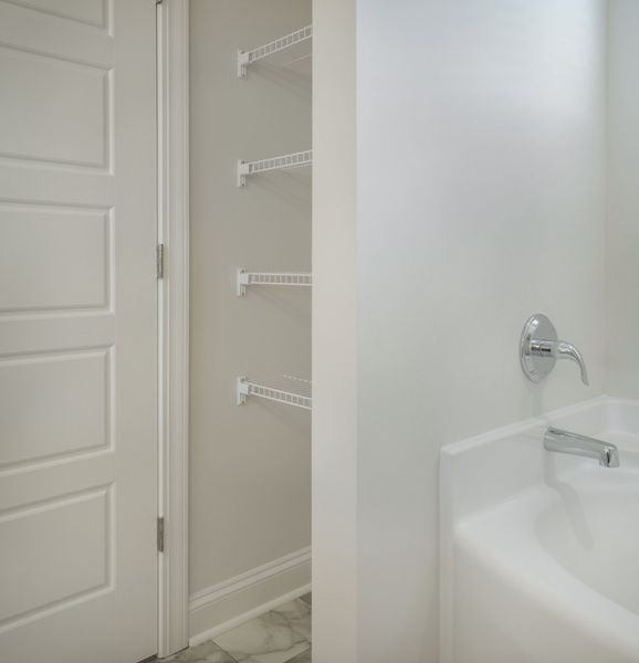 Representative furnished interior of a home built from the The McKee by Cothran Homes in Holly Ridge, Greenville (Image 16). Representative furnished interior of a home built from the The McKee by Cothran Homes in Holly Ridge, Greenville (Image 16).