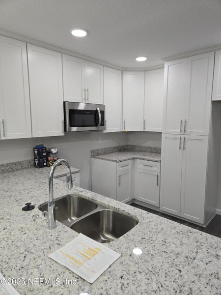 Furnished interior view inside a new home in , Jacksonville (Image 4). Furnished interior view inside a new home in , Jacksonville (Image 4).