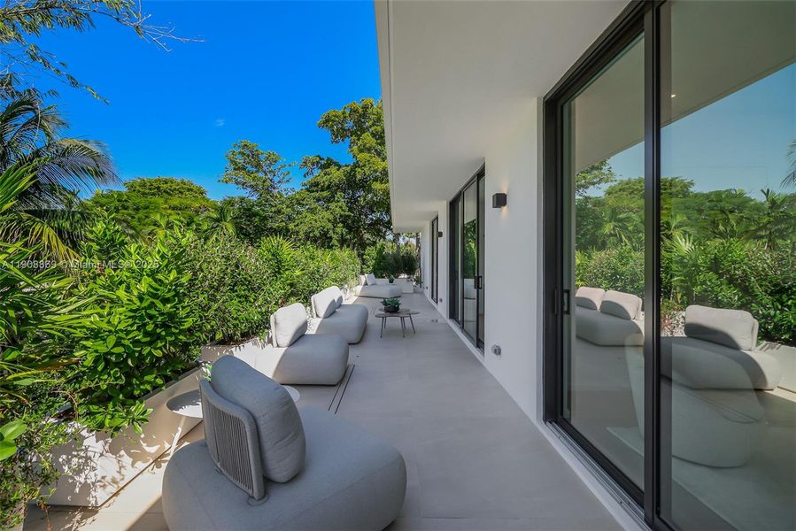 Exterior details and patio area of a home in , Miami (Image 3). Exterior details and patio area of a home in , Miami (Image 3).