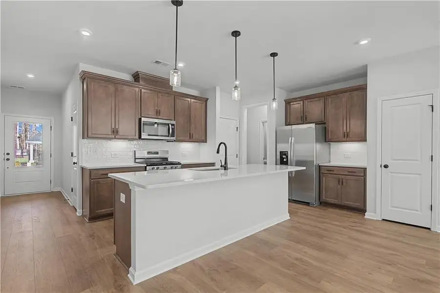 Furnished interior view inside a new home in Adler Springs, Powder Springs (Image 3).