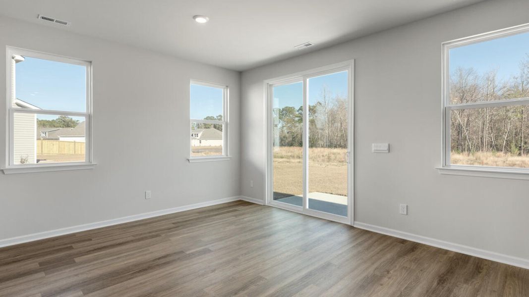 Representative unfurnished interior of a home built from the HARBOR OAK by D.R. Horton in Indigo Preserve, Leland (Image 25).