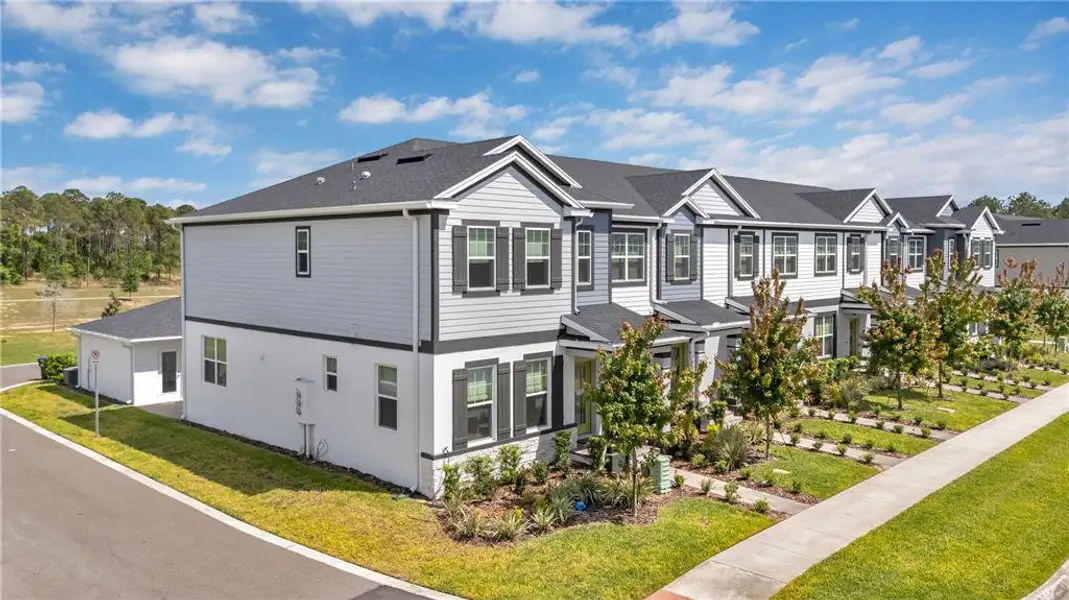 Front exterior of a new home in , Winter Garden, FL, highlighting curb appeal (Image 20).