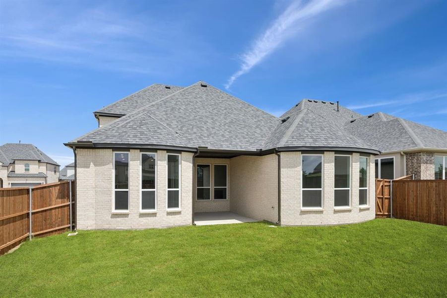 Front exterior of a new home in Bellagio, Forney, TX, highlighting curb appeal (Image 22). Front exterior of a new home in Bellagio, Forney, TX, highlighting curb appeal (Image 22).