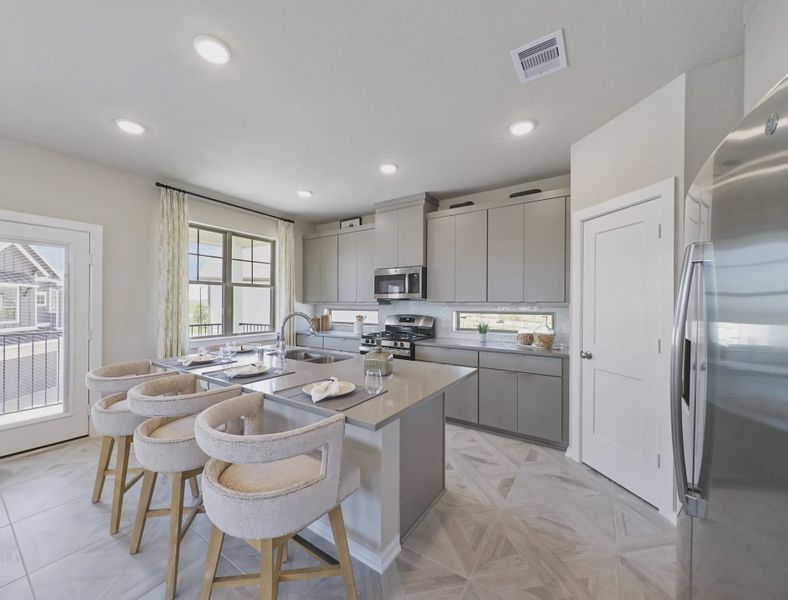 Representative furnished interior of a home built from the Storybrooke by Chesmar Homes in Sienna Courtyard, Missouri City (Image 8).