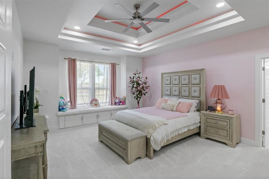 Bedroom featuring carpet floors, ceiling fan, and recessed lighting Bedroom featuring carpet floors, ceiling fan, and recessed lighting