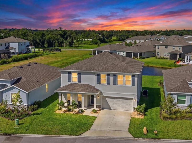 Front exterior of a new home in Coddington, Bradenton, FL, highlighting curb appeal (Image 22).