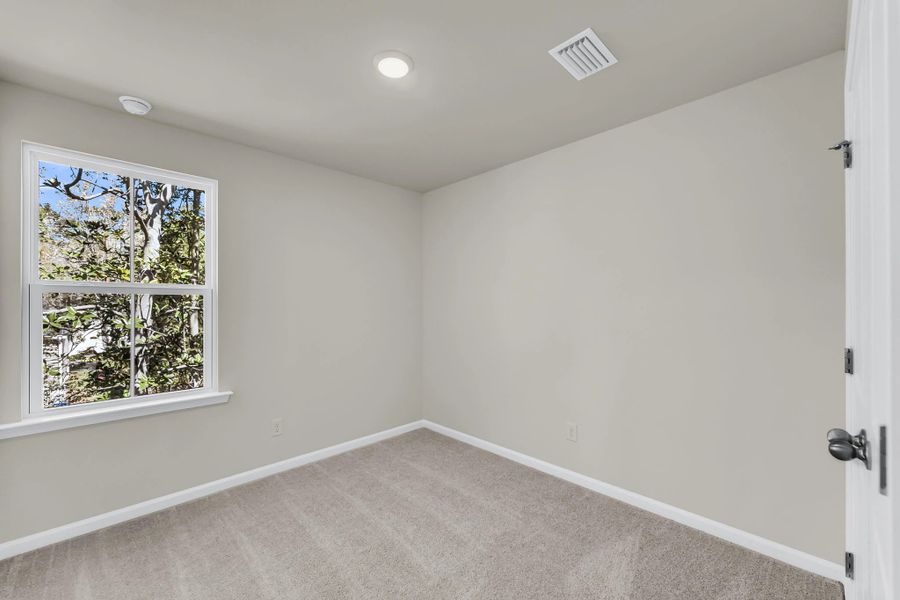 Spacious, unfurnished interior of a new home in Windward Village, Summerville (Image 12).