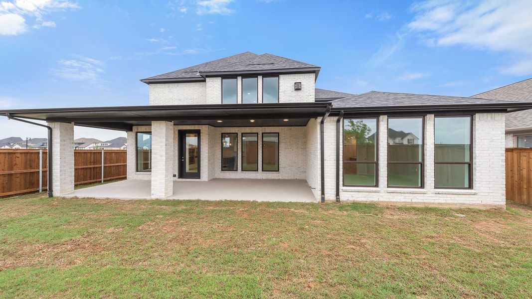 Exterior details and patio area of a home in Cambridge Crossing, Celina (Image 4).