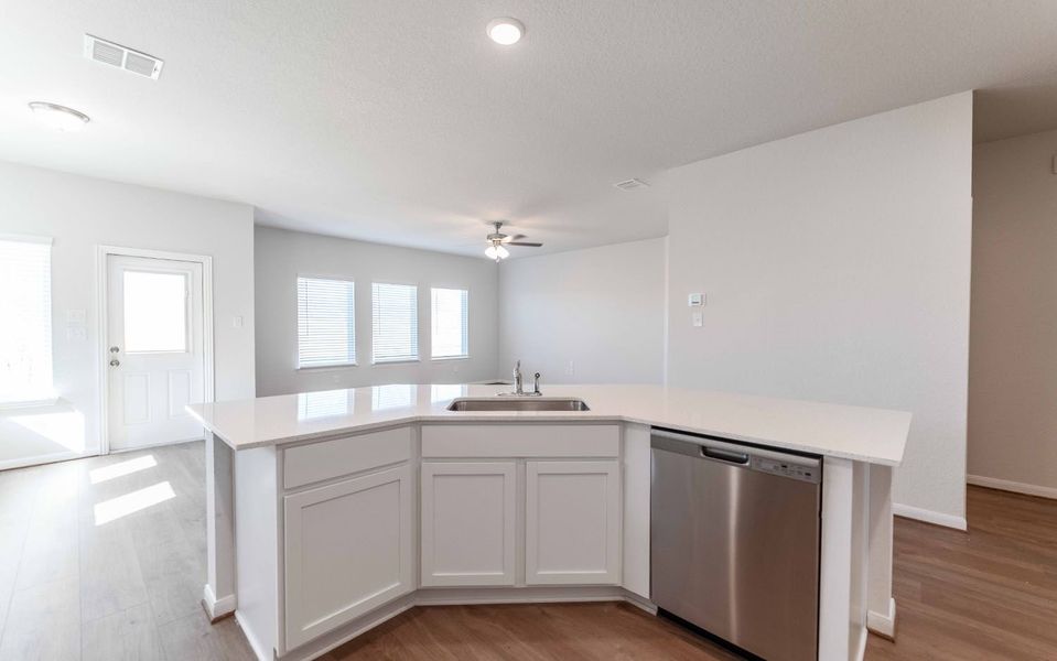 Furnished interior view inside a new home in Hennersby Hollow, San Antonio (Image 7).