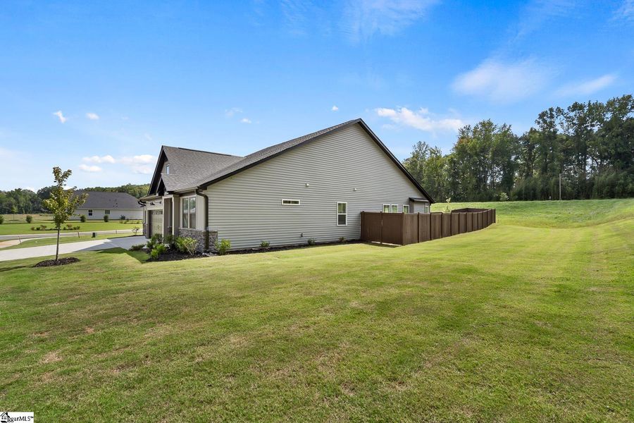 Exterior details and patio area of a home in Saratoga Oaks, Williamston (Image 20).