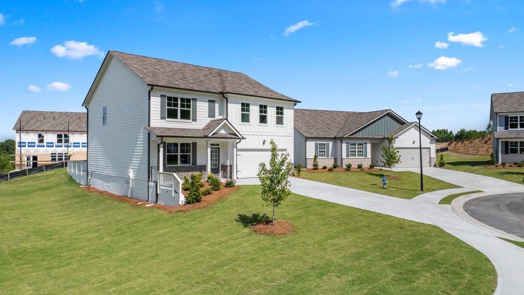 Representative exterior photo of a completed home built from the Hanover by D.R. Horton in Liberty Crossing, Braselton, GA (Image 2).