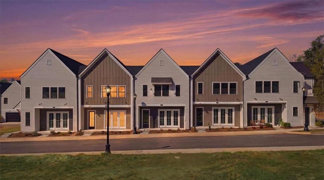 Front exterior of a new home in , Braselton, GA, highlighting curb appeal (Image 24).