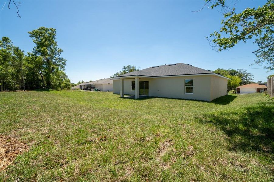 Exterior details and patio area of a home in , Deltona (Image 3).