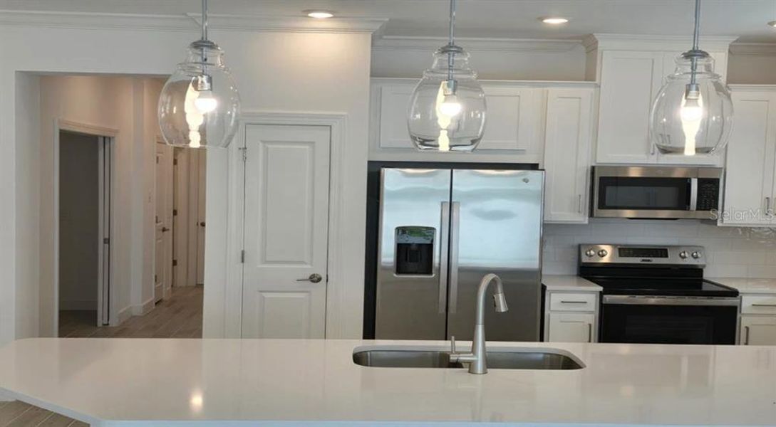 Furnished interior view inside a new home in The Cove at West Port, Port Charlotte (Image 15). Furnished interior view inside a new home in The Cove at West Port, Port Charlotte (Image 15).