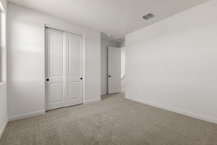 Spacious, unfurnished interior of a new home in Landmarke, San Tan Valley (Image 15).