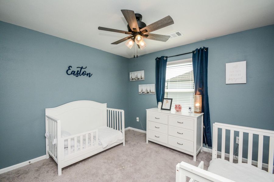 Furnished interior view inside a new home in Granger Pines, Conroe (Image 21).