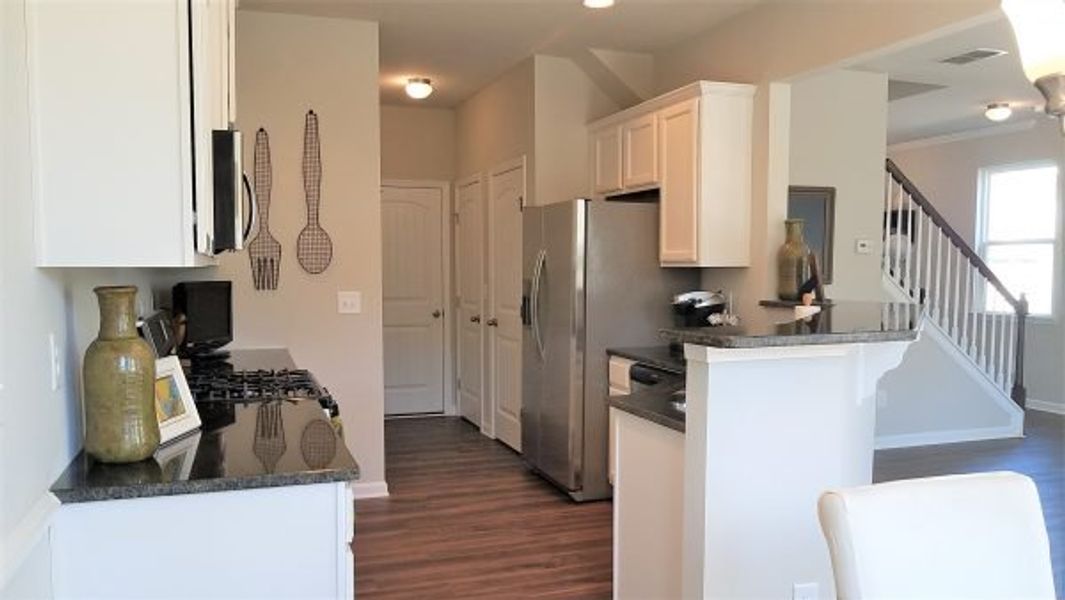 Representative furnished interior of a home built from the Emory by Piedmont Residential in Falls Creek, Flowery Branch (Image 5).