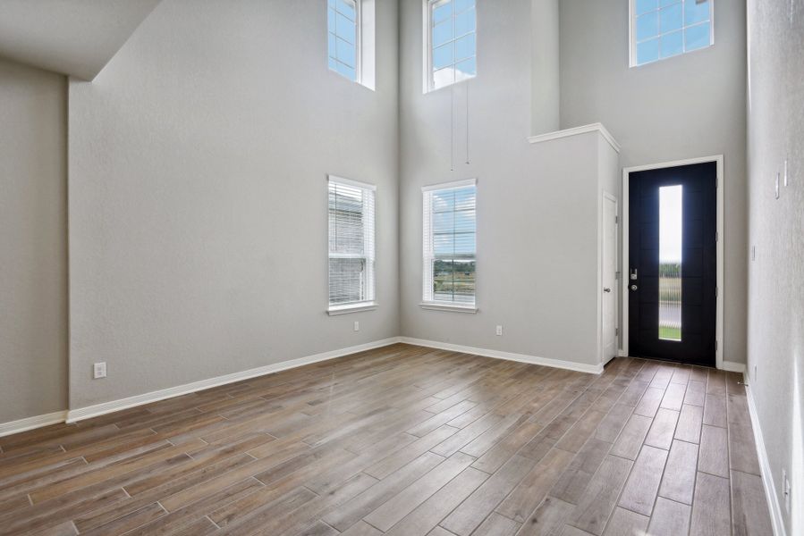 Living room in the Medina floorplan at a Meritage Homes community.