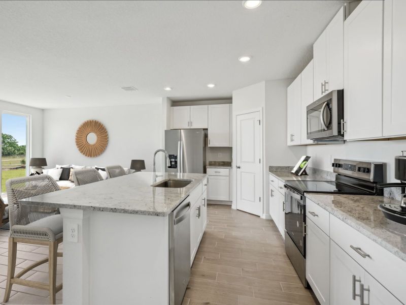Furnished interior view inside a new home in Meritage Homes at Terra Lago - Classic Series, Indiantown (Image 3). Furnished interior view inside a new home in Meritage Homes at Terra Lago - Classic Series, Indiantown (Image 3).
