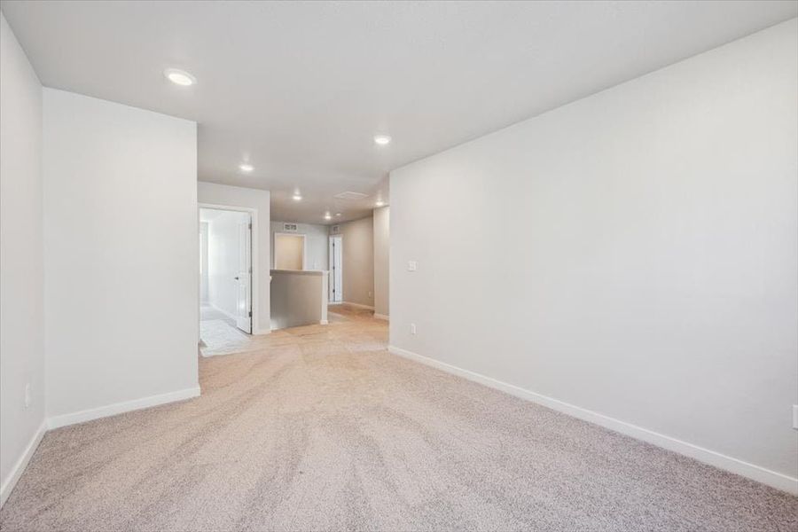 A long hallway with white walls. A long hallway with white walls.