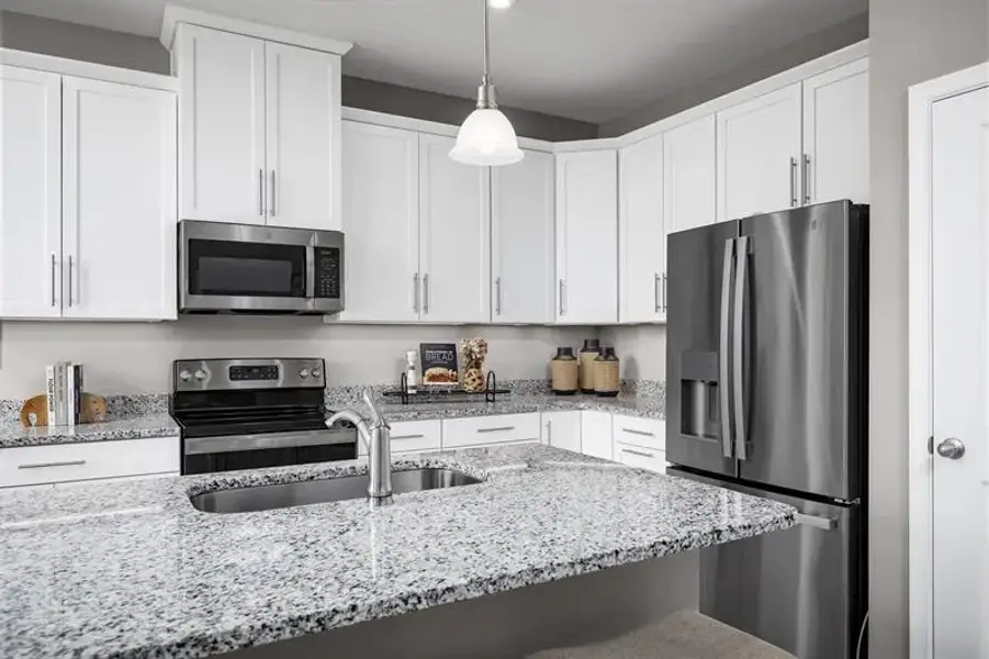 Representative furnished interior of a home built from the Adeline by Ryan Homes in Seminole Palms, Palm Coast (Image 2).