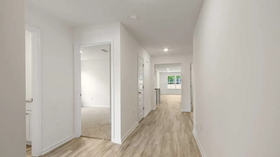 Spacious, unfurnished interior of a new home in Magnolia at the Bluffs Phase 3, Freeport (Image 12). Spacious, unfurnished interior of a new home in Magnolia at the Bluffs Phase 3, Freeport (Image 12).