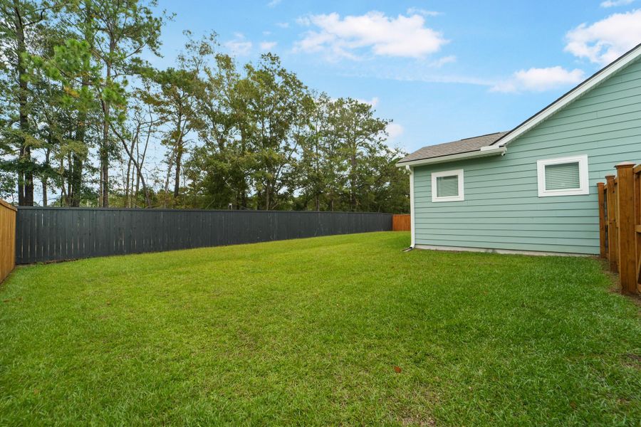 Front exterior of a new home in , Johns Island, SC, highlighting curb appeal (Image 29). Front exterior of a new home in , Johns Island, SC, highlighting curb appeal (Image 29).