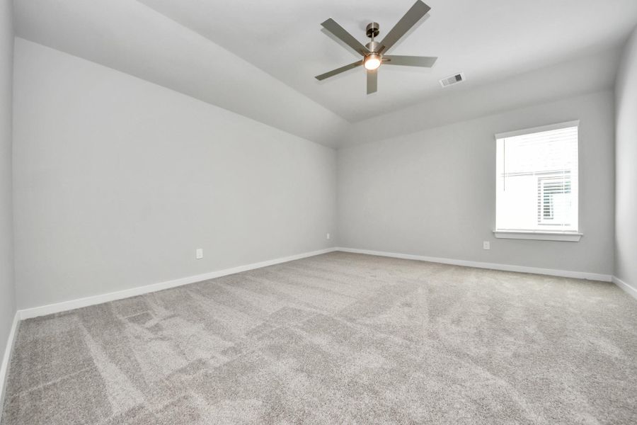 Come upstairs and enjoy a day of leisure in this fabulous game room! This is the perfect hangout spot or adult game room! Features plush carpet, high ceilings, custom paint and windows for plenty of natural light. Sample photo of completed home with similar floor plan. Actual colors and selections may vary. Come upstairs and enjoy a day of leisure in this fabulous game room! This is the perfect hangout spot or adult game room! Features plush carpet, high ceilings, custom paint and windows for plenty of natural light. Sample photo of completed home with similar floor plan. Actual colors and selections may vary.