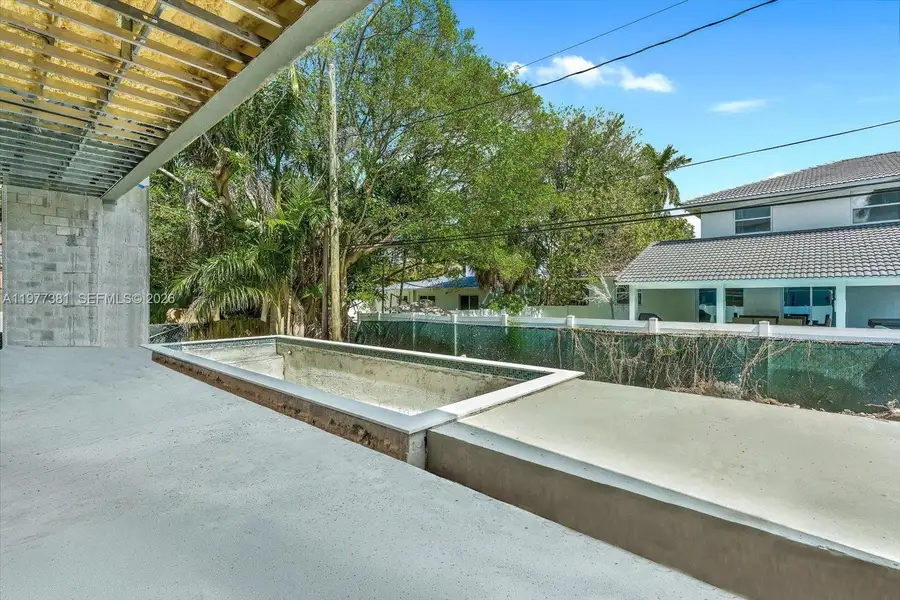 Exterior details and patio area of a home in , North Bay Village (Image 16).