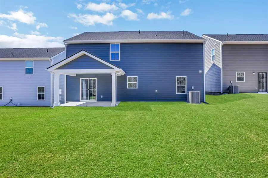 Exterior details and patio area of a home in Summertree, Stone Mountain (Image 3).