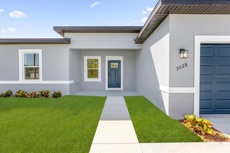 Front exterior of a new home in , Ocala, FL, highlighting curb appeal (Image 25). Front exterior of a new home in , Ocala, FL, highlighting curb appeal (Image 25).