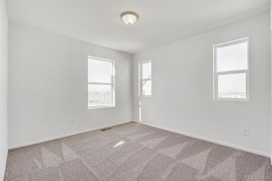 Spacious, unfurnished interior of a new home in Turnberry Villas, Commerce City (Image 21).