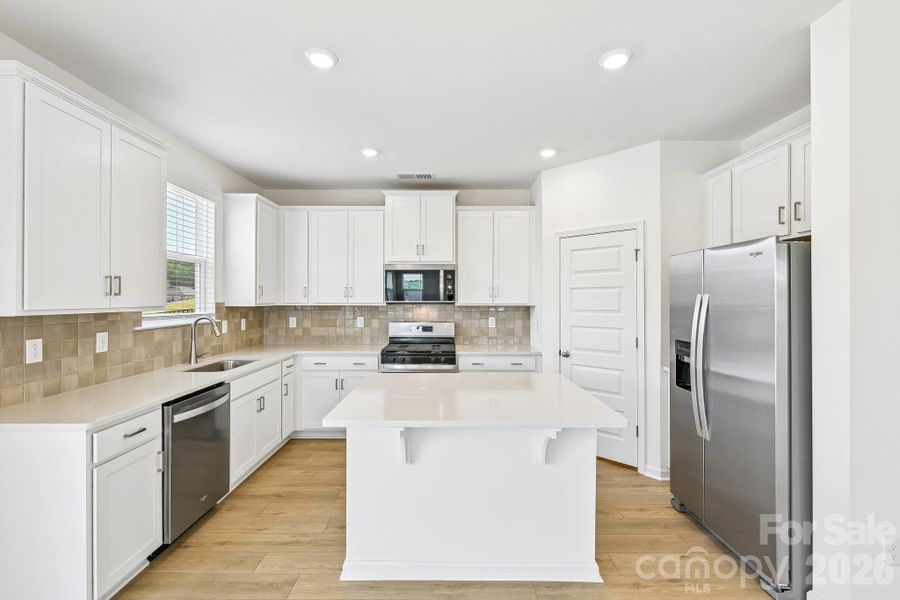 Furnished interior view inside a new home in Bella Vista Heritage, Denver (Image 9).
