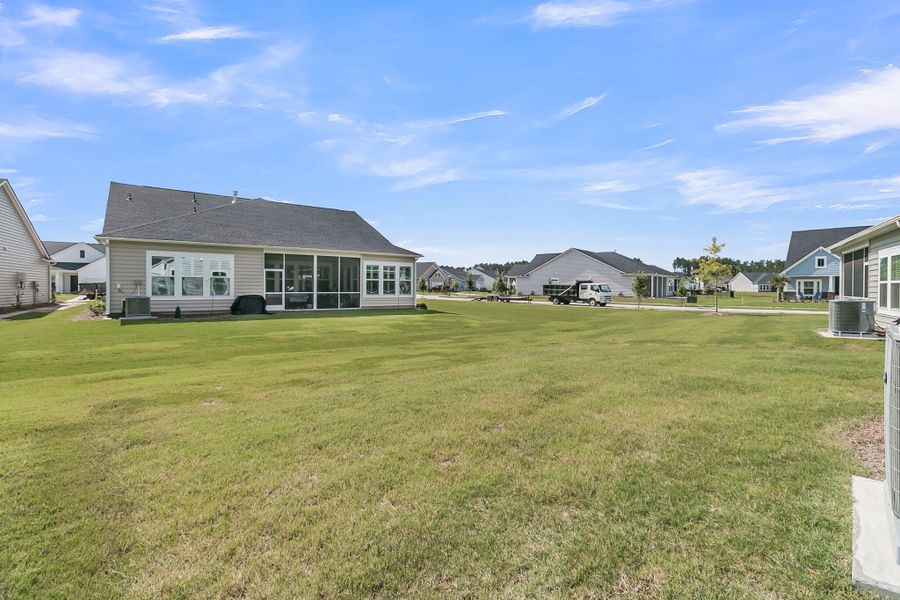 Front exterior of a new home in Horizons at Summers Corner | 55+: The Cottages, Summerville, SC, highlighting curb appeal (Image 25). Front exterior of a new home in Horizons at Summers Corner | 55+: The Cottages, Summerville, SC, highlighting curb appeal (Image 25).
