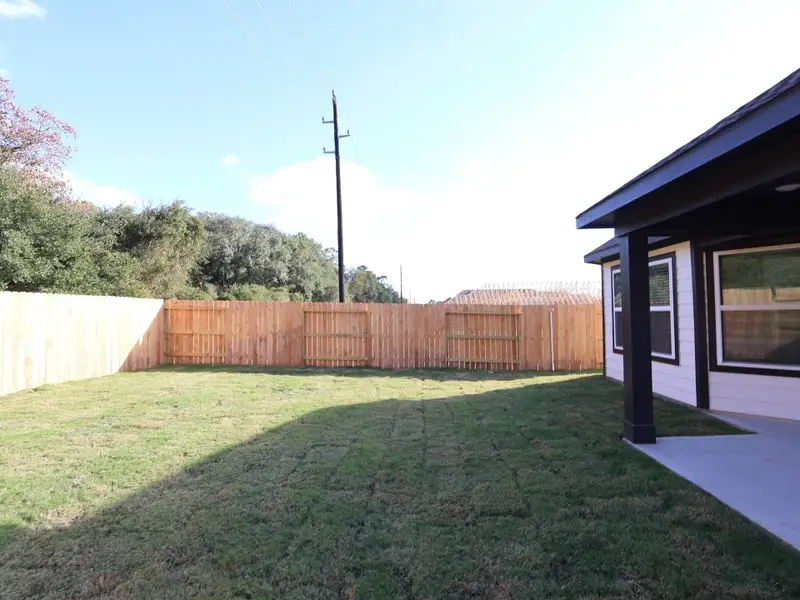 Exterior details and patio area of a home in Sorella, Tomball (Image 3). Exterior details and patio area of a home in Sorella, Tomball (Image 3).