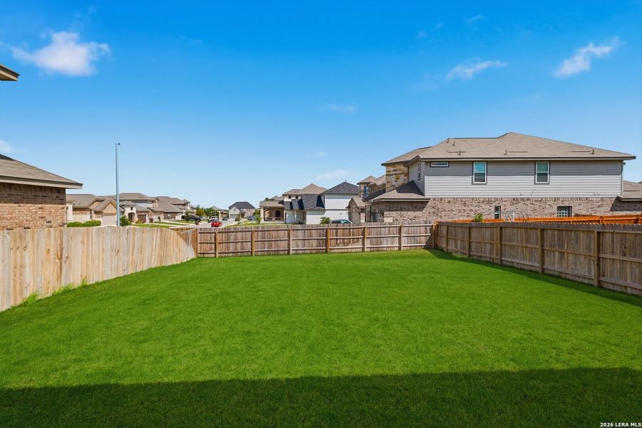 Exterior details and patio area of a home in Horizon Pointe, Converse (Image 25).