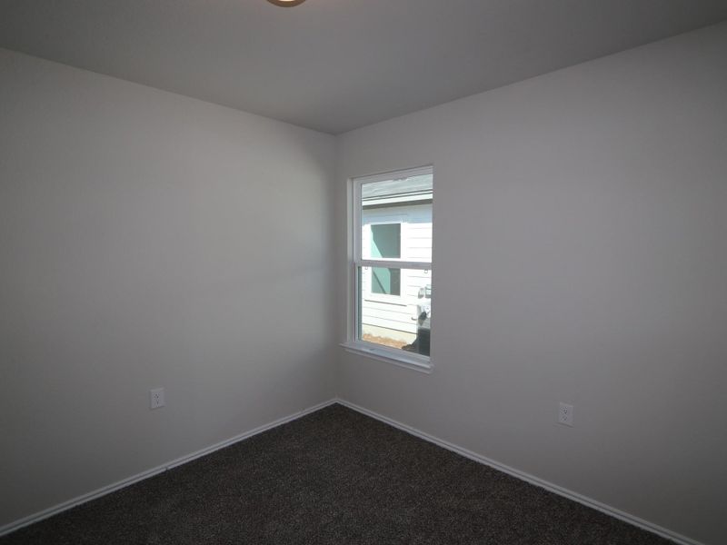 Spacious, unfurnished interior of a new home in Marble Creek Crossing, Austin (Image 11).