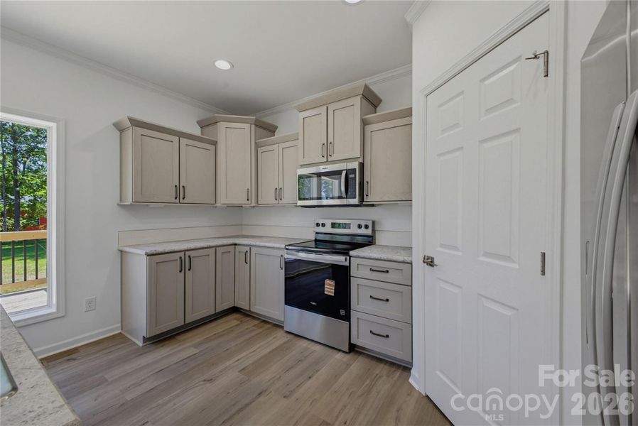 Furnished interior view inside a new home in , Newton (Image 17).