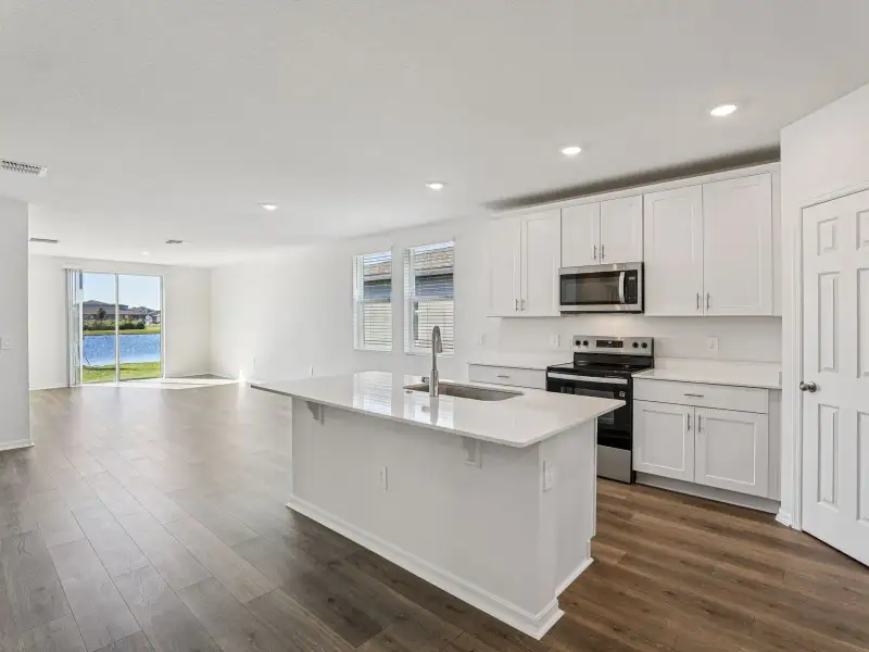 Furnished interior view inside a new home in Villamar - Signature Series, Winter Haven (Image 4).
