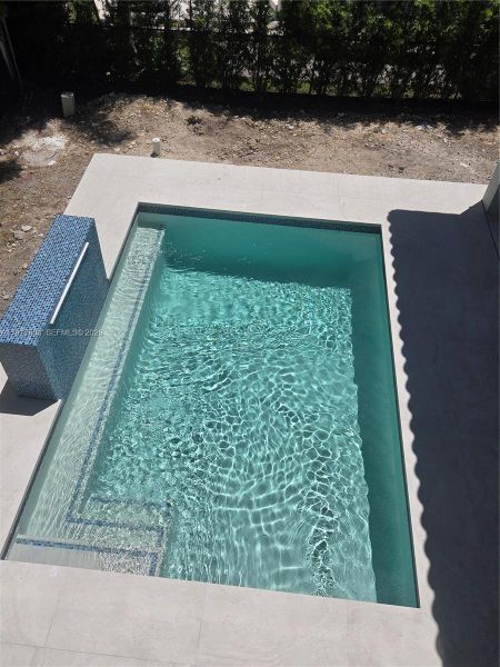 Exterior details and patio area of a home in , Coral Gables (Image 4).
