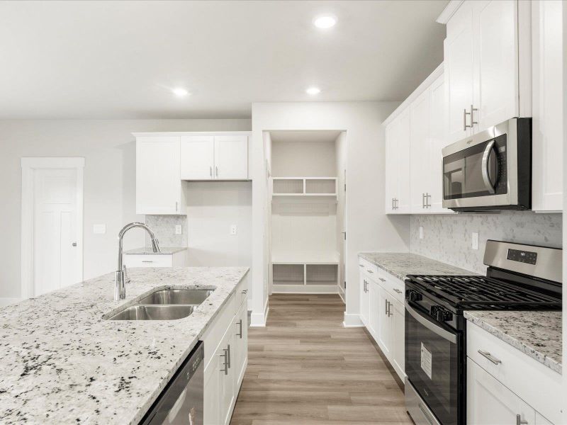 Photo is not of the actual home, but is an inspirational photo of builder’s model home and may depict options, furnishings, and/or decorator features that are not included