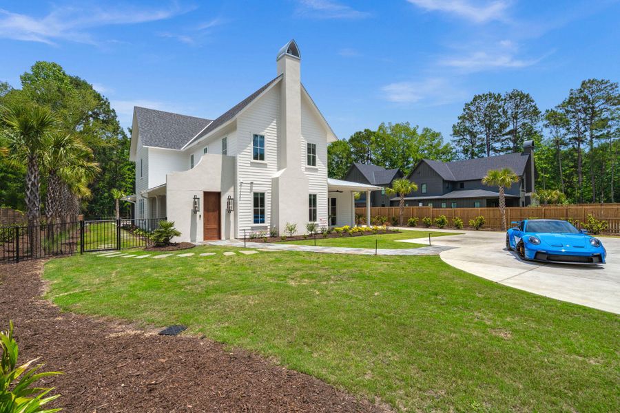 Front exterior of a new home in , Johns Island, SC, highlighting curb appeal (Image 28).