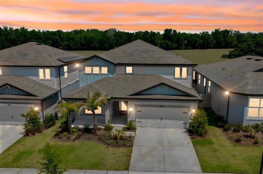 Front exterior of a new home in , Valrico, FL, highlighting curb appeal (Image 25).