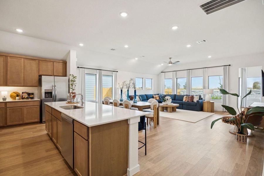 Kitchen in the Diamond home plan by Trophy Signature Homes – REPRESENTATIVE PHOTO