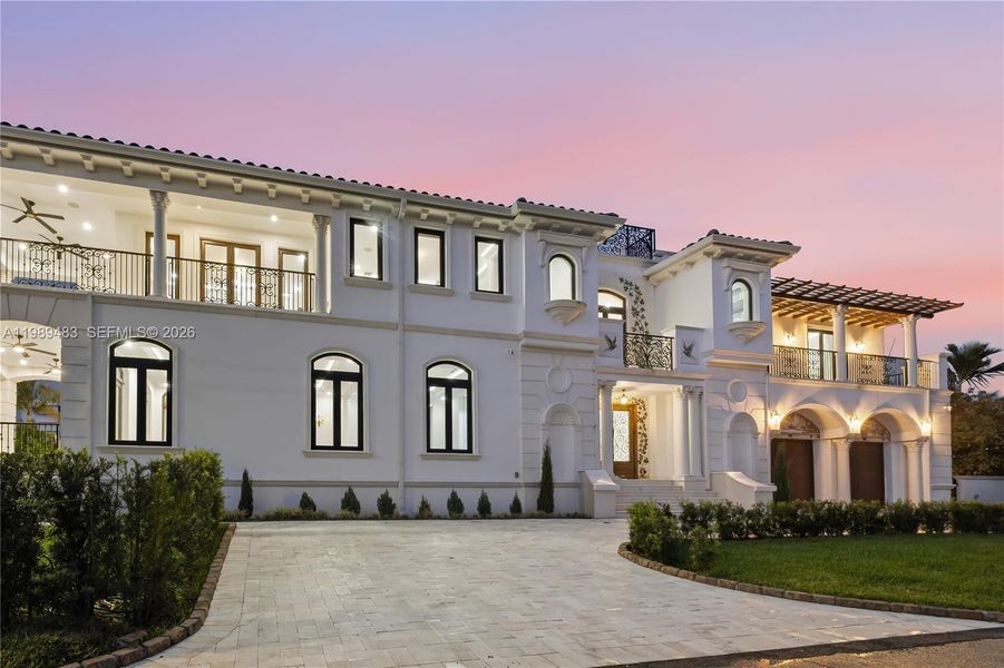 Front exterior of a new home in , Surfside, FL, highlighting curb appeal (Image 31).