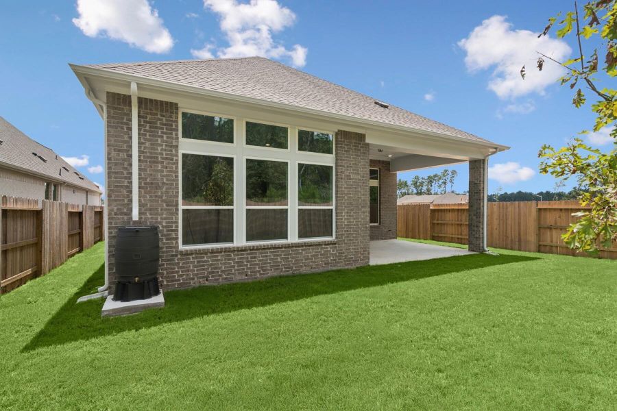 Exterior details and patio area of a home in ARTAVIA 45' Homesites, Conroe (Image 25).