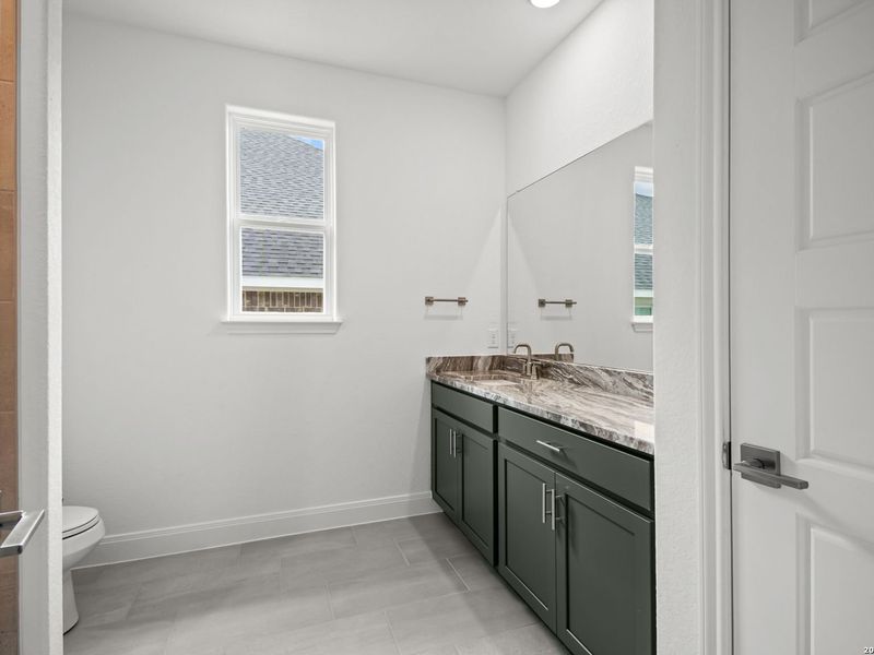 Furnished interior view inside a new home in The Reserve at Potranco Oaks, Castroville (Image 15).